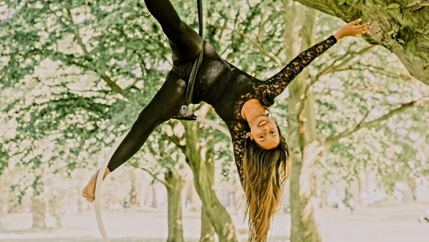 Niparun is pictured performing acrobatics with a hoop
