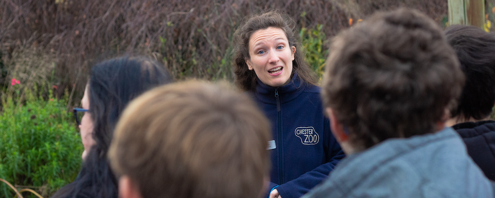 An employee of Chester Zoo speaks to a group of young people at the Zoo.