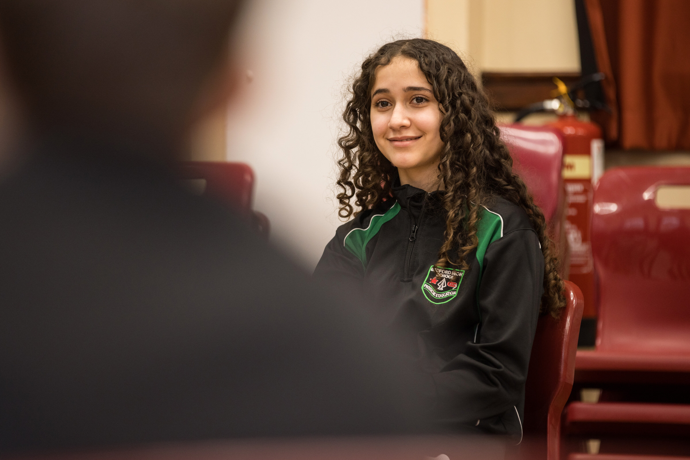 Teenage student taking part in a workshop at school.