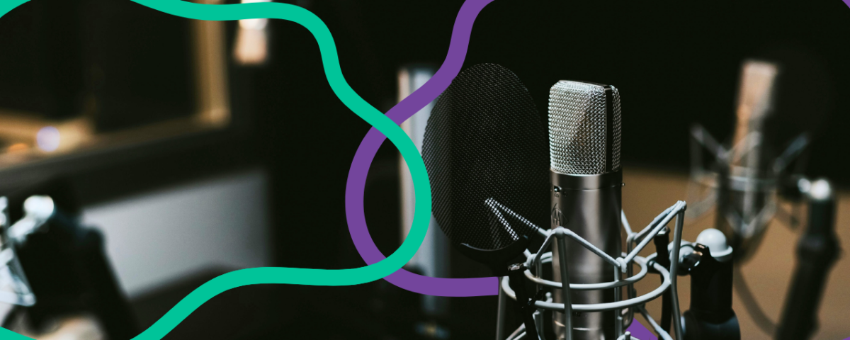A mic stand surrounded by colourful squiggles.